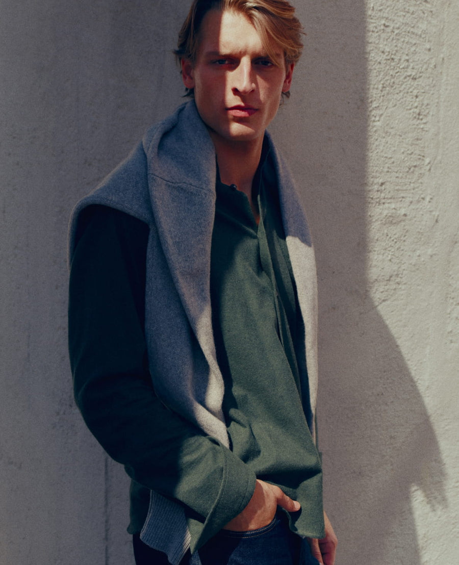 An Eton cashmere sweater over a green flannel shirt
