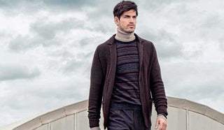 Picture of man wearing a Fall jacket and turtle neck from Alpha Studio