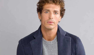 Picture of man wearing a long blue coat from Bolgioli