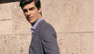 Picture of man looking back, wearing a Boglioli jacket