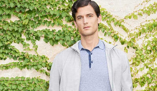 Image of man wearing a polo shirt and jacket from Canali