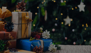 Picture of gifts at the bottom of the Christmas tree