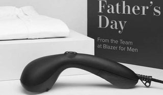 Close up image of a handheld portable steamer