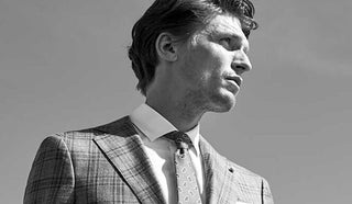 Black and white Image of man wearing a Luigi Bianchi Mantova suit
