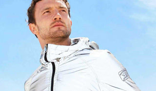 Picture of man wearing a silver jacket from Paul & Shark