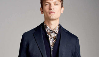 Picture of man wearing a suit from Sand