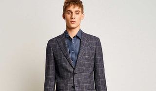 Picture of man wearing a sport coat from Sand