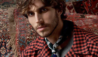 Image of man wearing a Tintoria Mattei jacket, along with a scarf