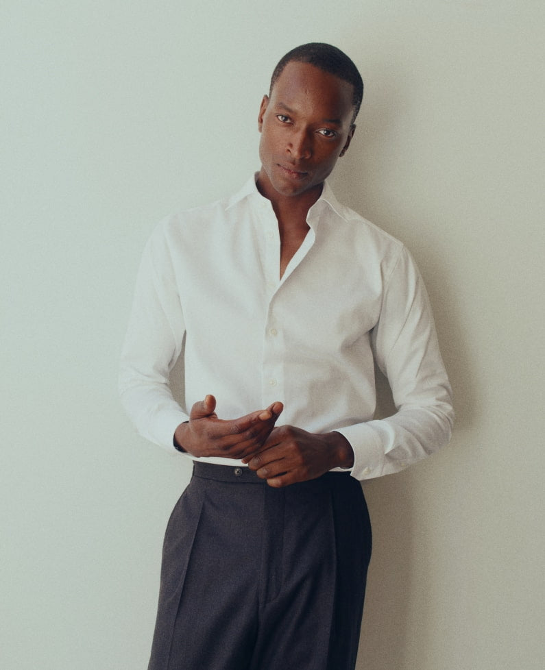 A man in a white Eton Signature Twill shirt
