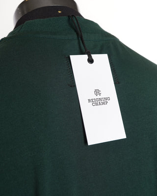 Reigning Champ Label