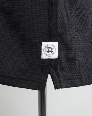 Reigning Champ Label